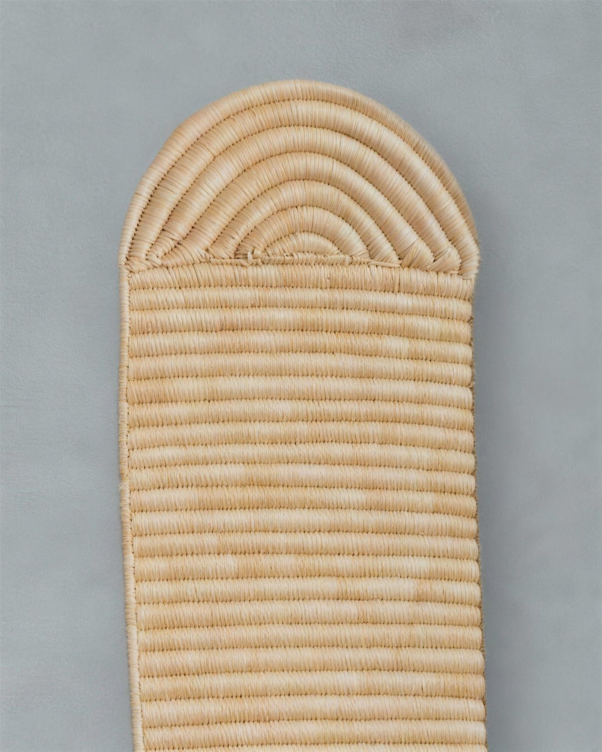 Close-up of the rounded cap and straight woven rows at the top of Abstract Wall Mask 3