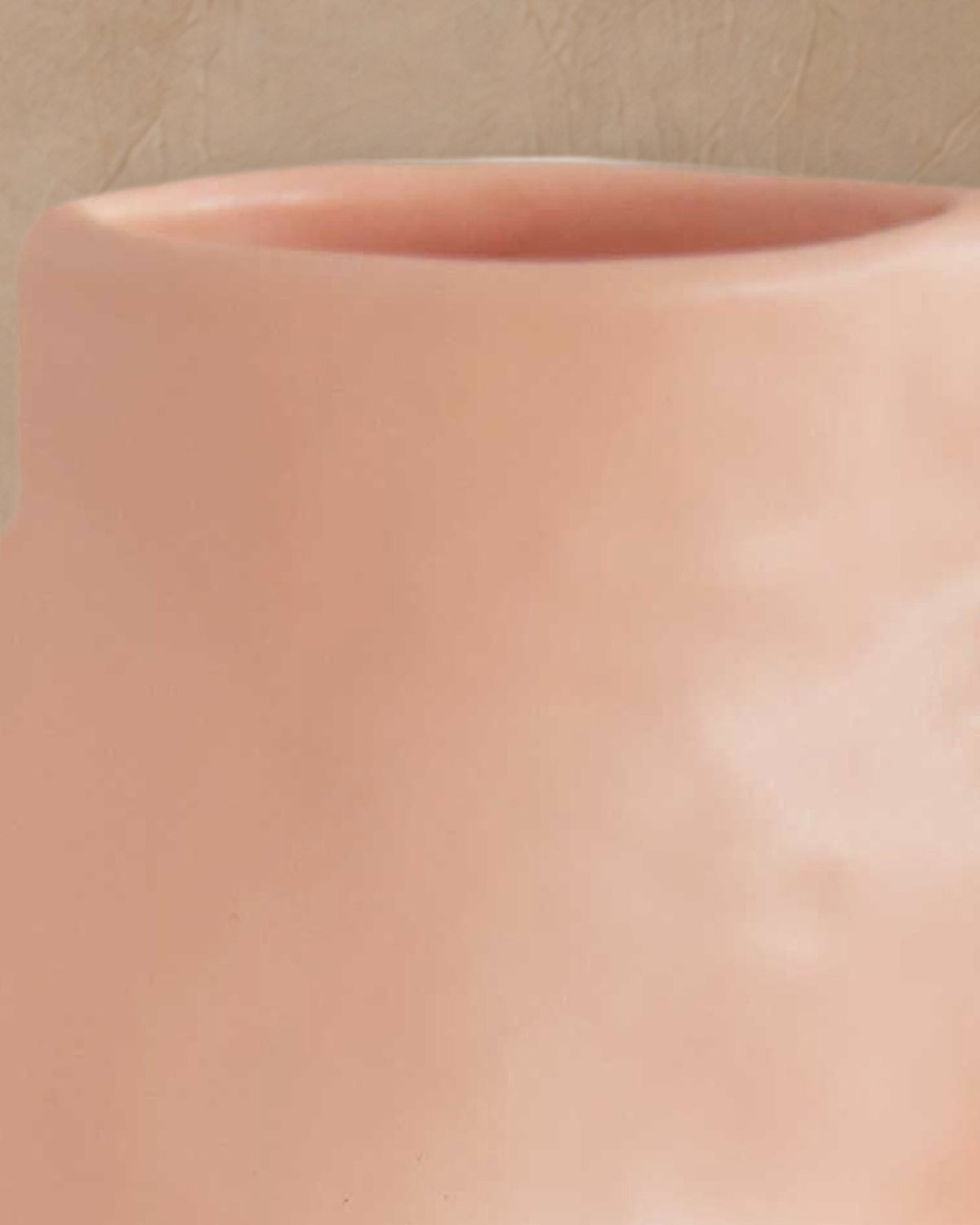 Close-up of the rounded rim and soft pink glaze of the Fluxo large pink vase