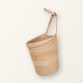 Kata braided natural jute wall basket hanging from a wooden wall peg (peg not included)