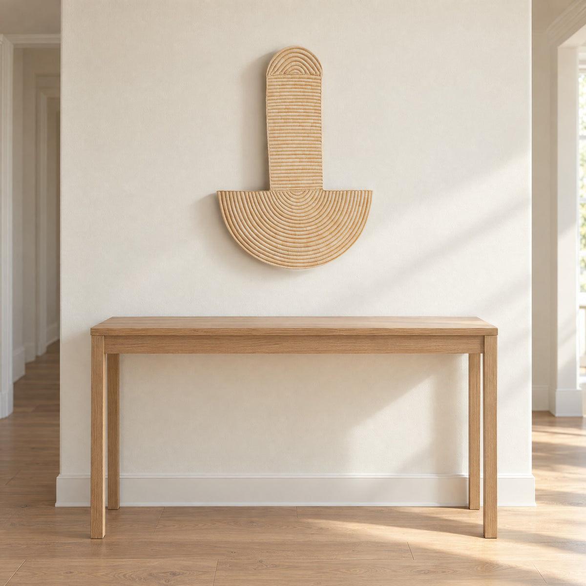 Abstract Wall Mask 3 hung on a warm white hallway wall above a slim oak console table