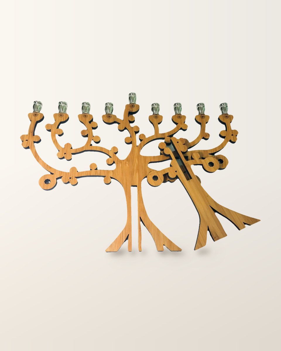 The two flat bamboo pieces of the Tree of Life menorah, taken apart