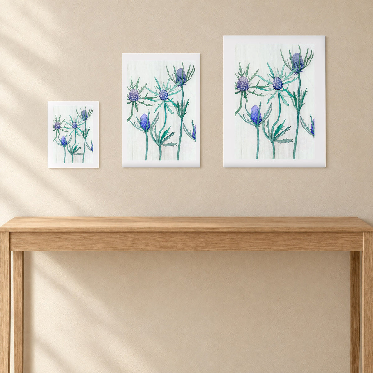 The three unframed print sizes side by side for scale: 8.5 × 11, 13 × 19 and 17 × 22 in; one print per order