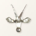 Sable antelope mask of recycled car tin, white paint worn back to bare metal, with two long horns; colour varies