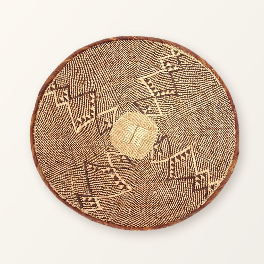 One Tonga basket up close, showing the coiled rim and woven pattern; an example only, patterns vary