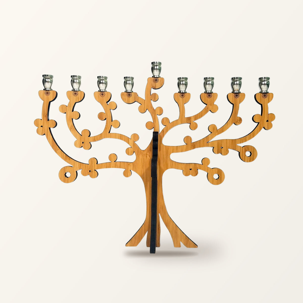 Tree of Life menorah in amber bamboo with nine nickel candle cups, the center cup raised