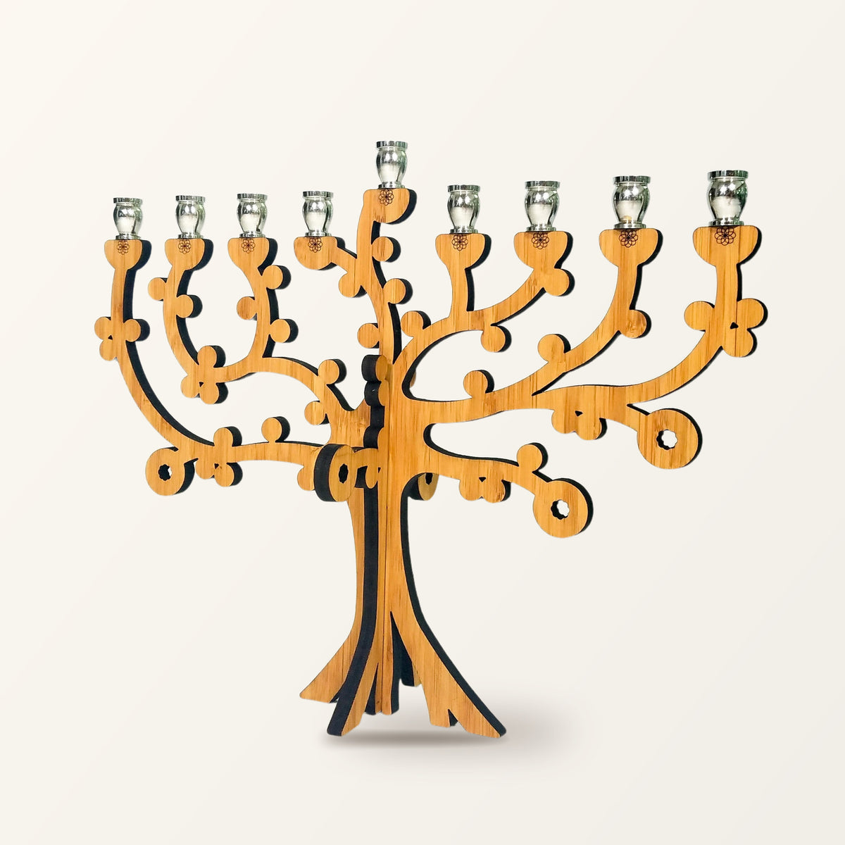 Tree of Life menorah from an angle, showing the slotted cross piece it stands on
